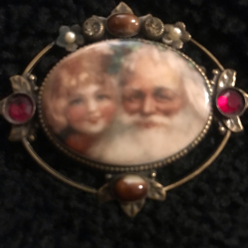 Vintage Santa and the girl brooch with Ruby stone.